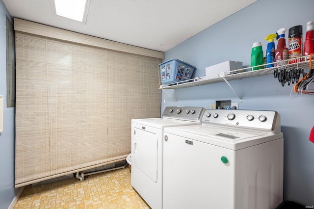 washroom with washer and dryer