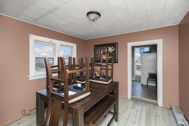 dining area with light hardwood / wood-style flooring