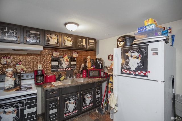 kitchen with dark brown cabinetry, exhaust hood, dark tile flooring, sink, and white appliances