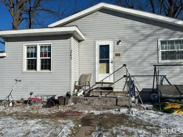 view of snow covered property