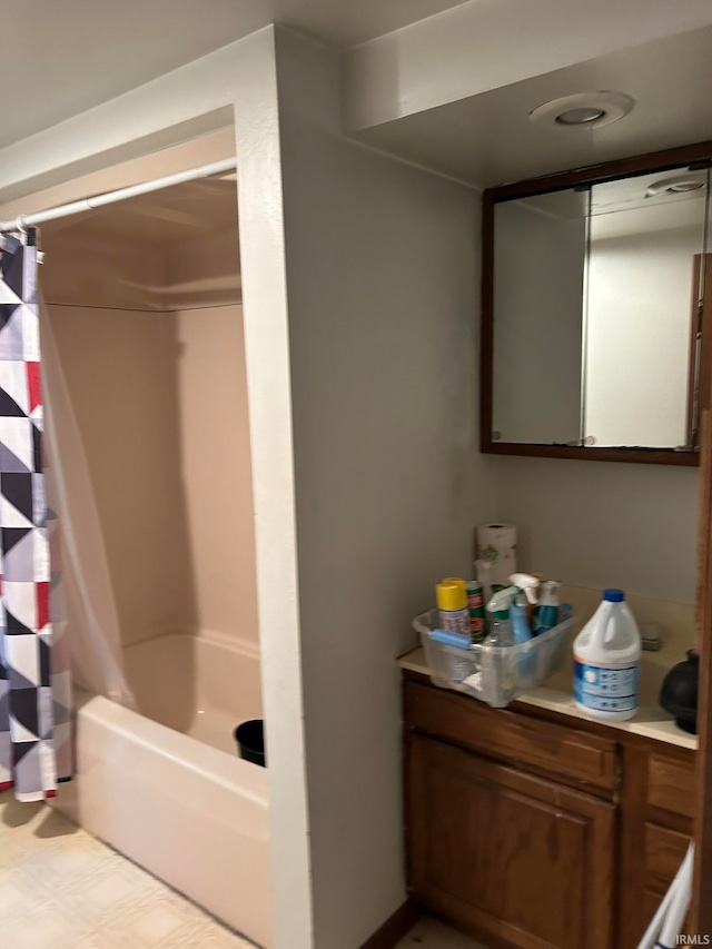 bathroom with shower / bath combination with curtain, tile flooring, and vanity