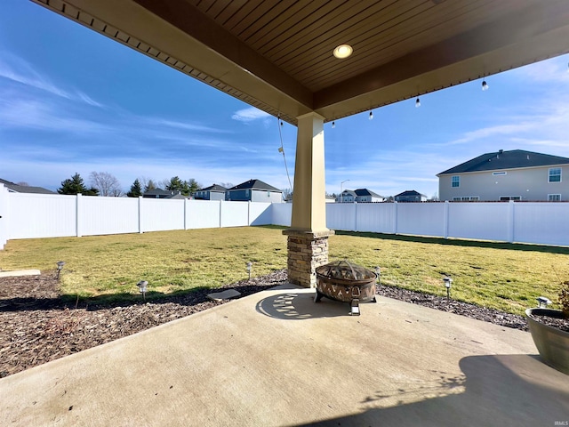 view of patio / terrace featuring an outdoor fire pit