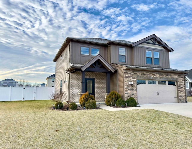 craftsman-style home featuring a front lawn and a garage