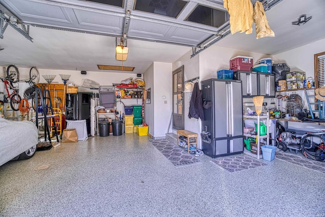 garage featuring a garage door opener