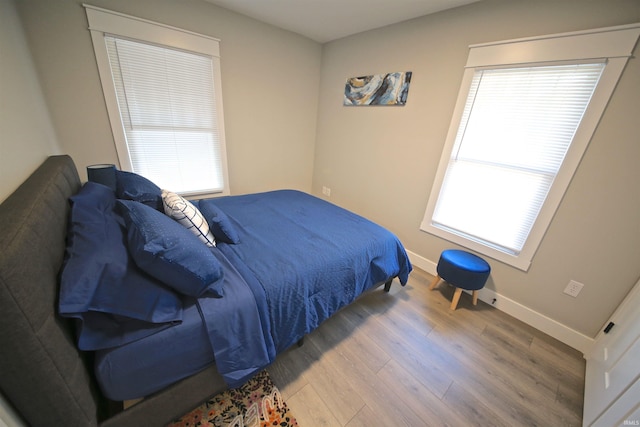 bedroom featuring hardwood / wood-style flooring