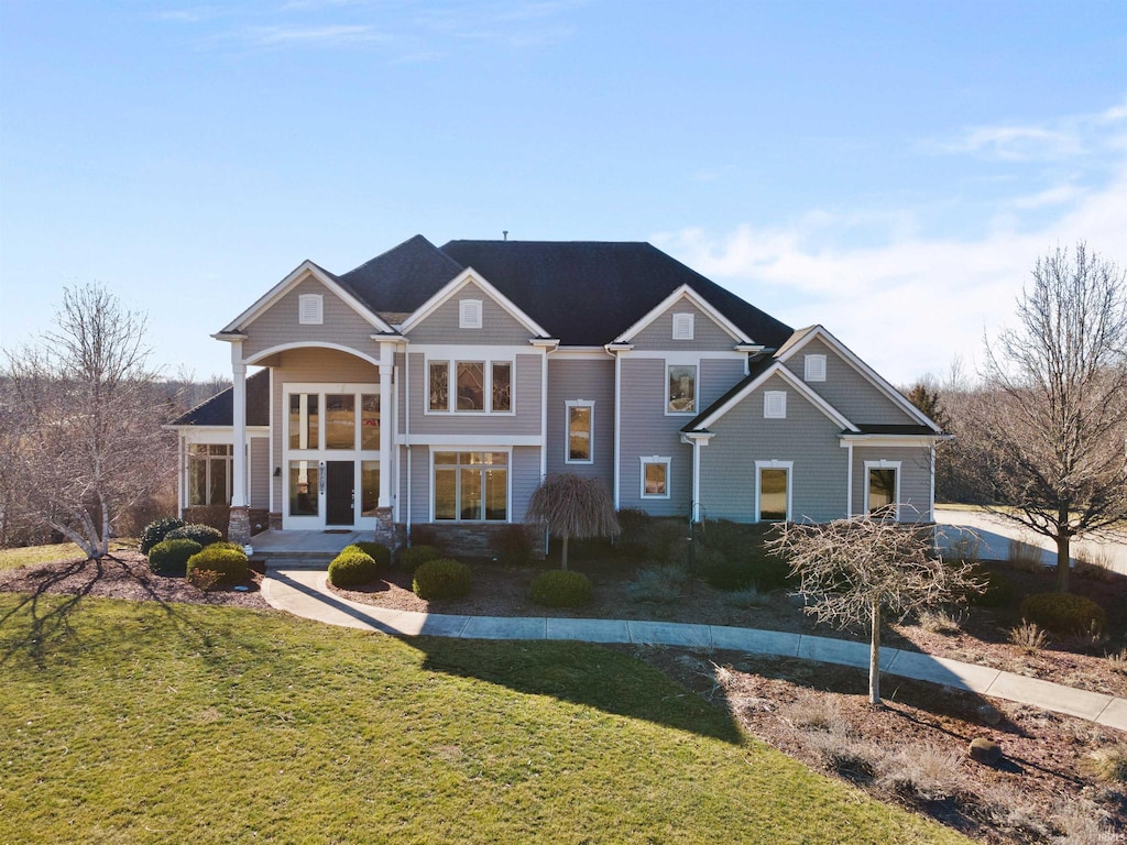 view of front of home with a front lawn