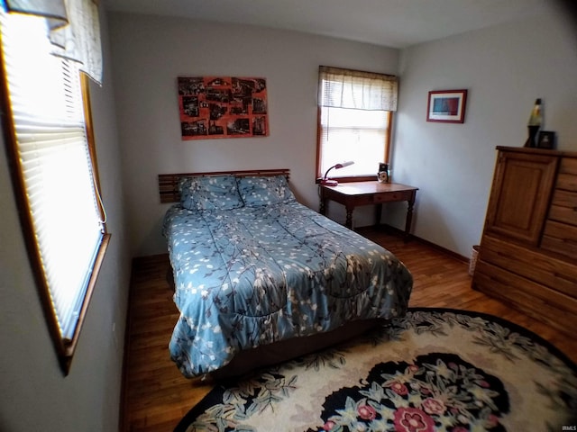 bedroom featuring dark hardwood / wood-style floors