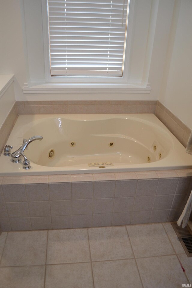 bathroom featuring tile flooring