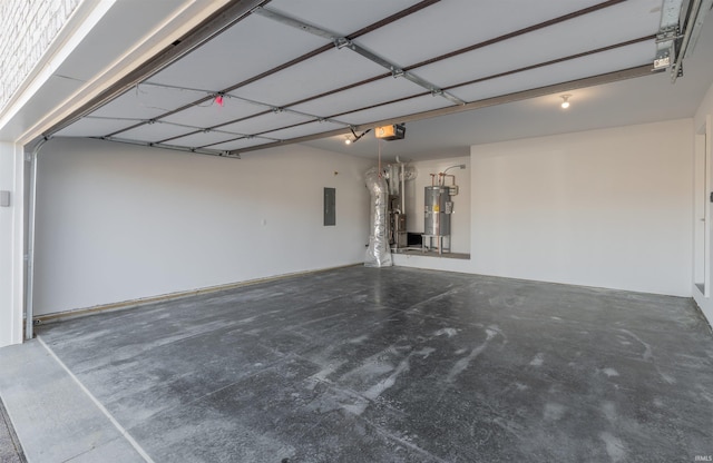 garage with a garage door opener, electric panel, and water heater