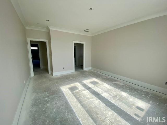 unfurnished bedroom featuring crown molding