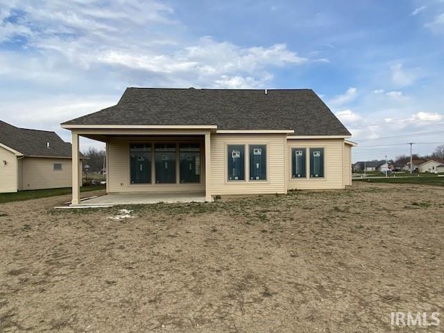 rear view of property featuring a patio