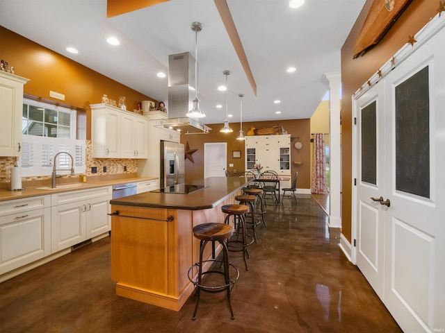 kitchen with island exhaust hood, appliances with stainless steel finishes, backsplash, a kitchen bar, and a center island