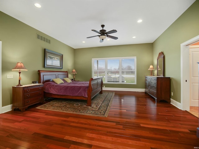 bedroom featuring ceiling fan and dark wood-type flooring