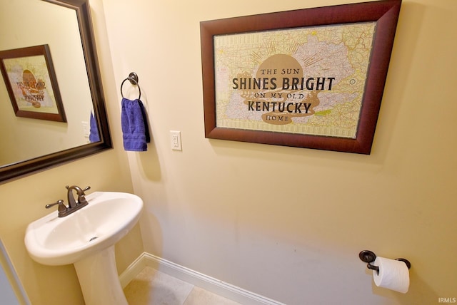 bathroom with tile flooring