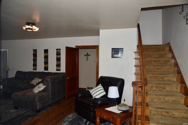 living room featuring dark wood-type flooring