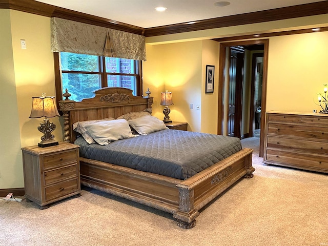 bedroom with ornamental molding and light colored carpet