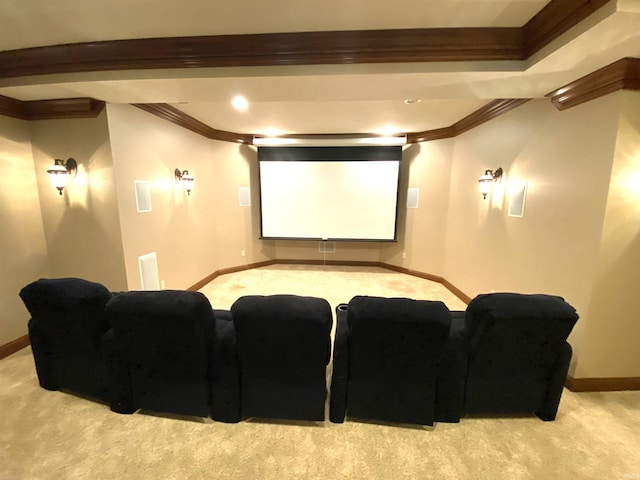 carpeted home theater with crown molding