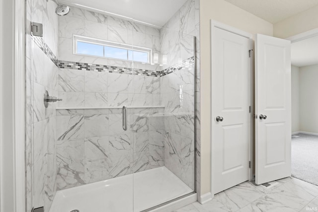 bathroom with tile flooring and an enclosed shower