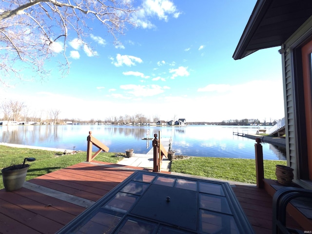 dock area with a water view