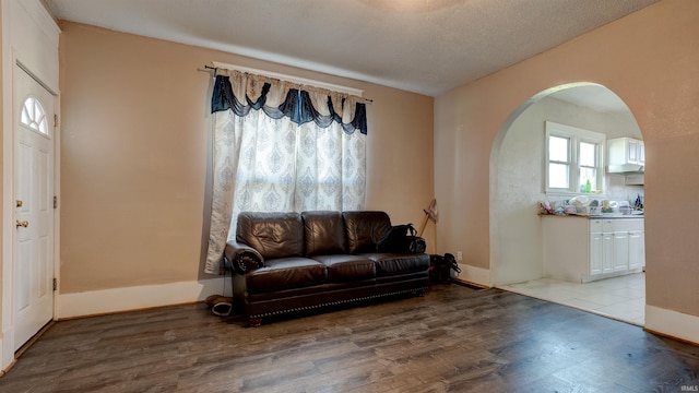 sitting room featuring light tile floors