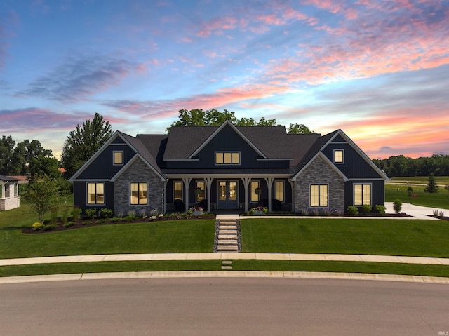 craftsman-style house featuring a lawn