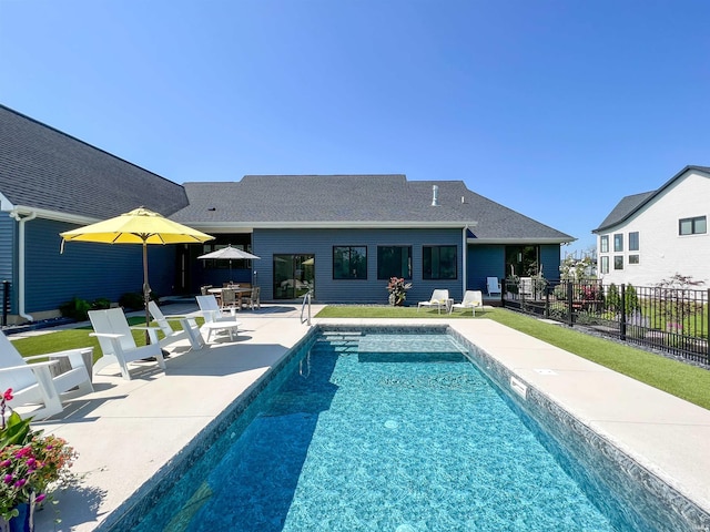 view of pool featuring a patio