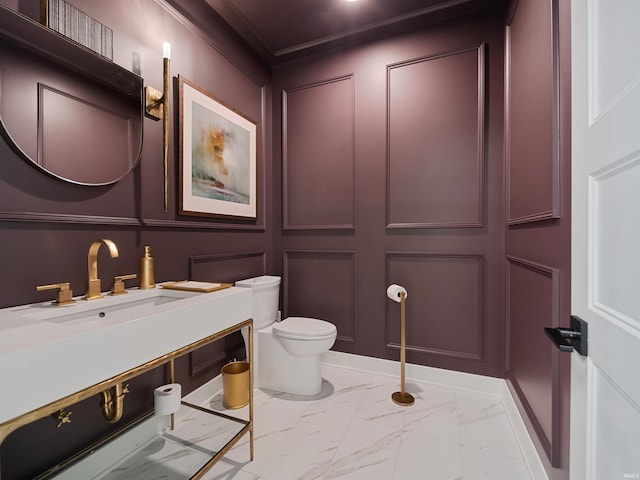 bathroom featuring toilet, tile flooring, and vanity