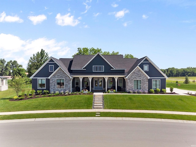 craftsman-style home with a front yard