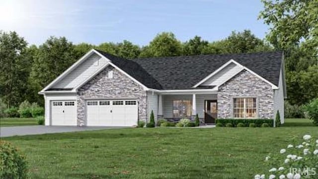 craftsman house featuring a front yard and a garage