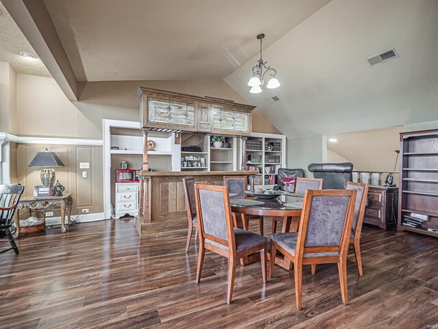 dining space featuring vaulted ceiling, a notable chandelier, and dark wood-type flooring