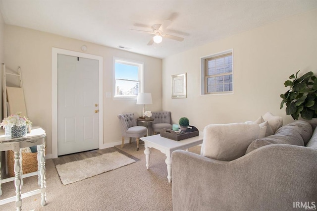 living room featuring ceiling fan