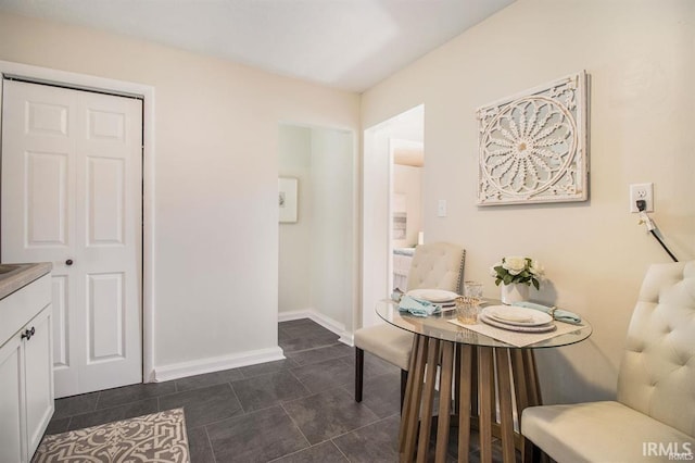 view of tiled dining space