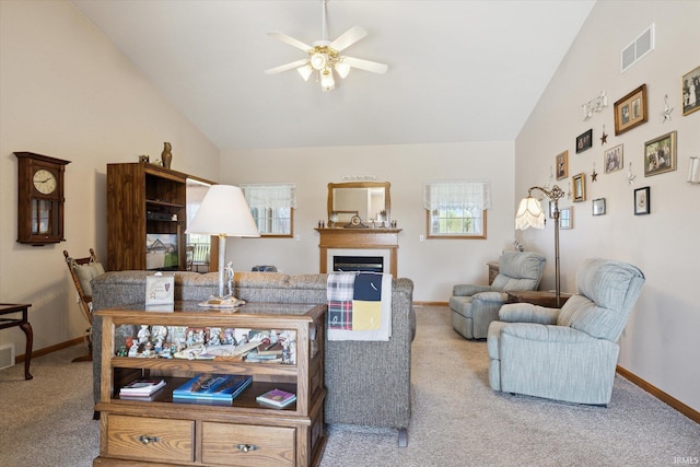 living room with high vaulted ceiling, carpet, and ceiling fan