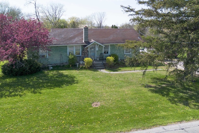 view of front of home with a front yard