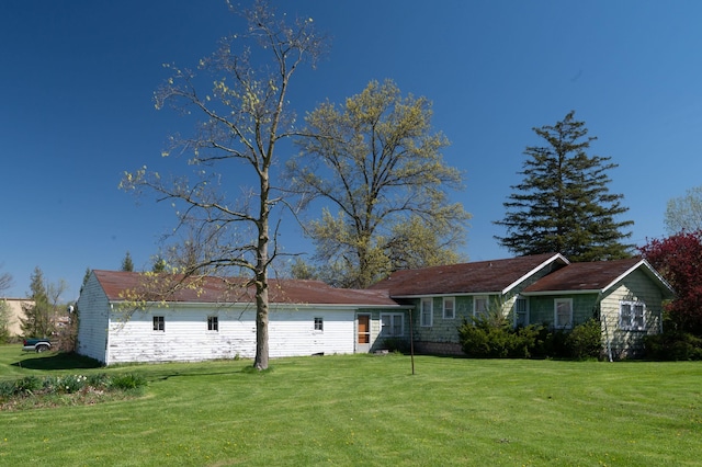 exterior space with a yard