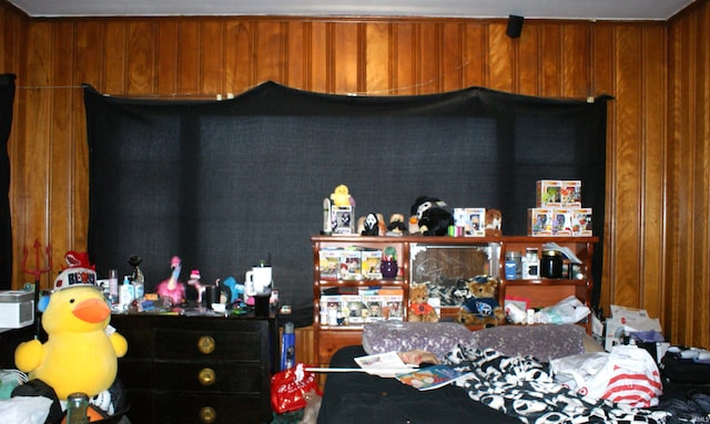 bedroom with wooden walls