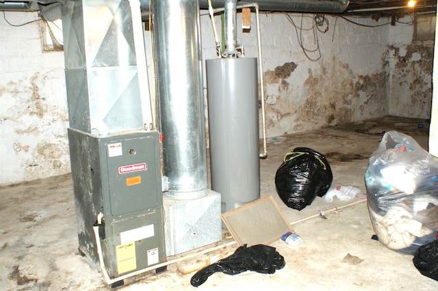 utility room with water heater