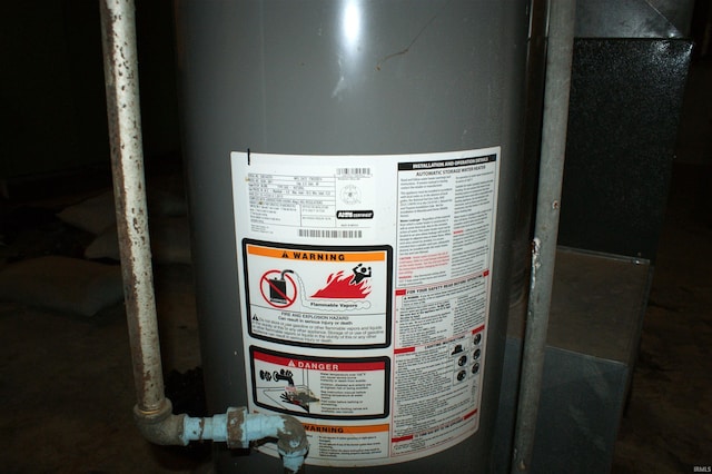 utility room with water heater