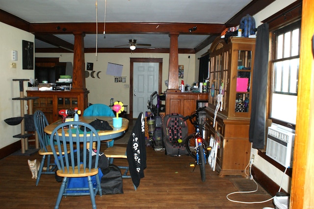 dining room with wood-type flooring, beam ceiling, and ceiling fan