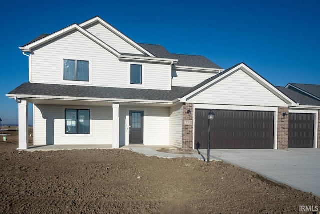 view of front of property with a garage