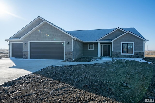 craftsman-style house featuring a garage