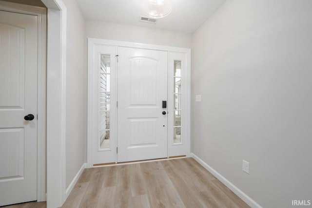 entryway with light wood-type flooring