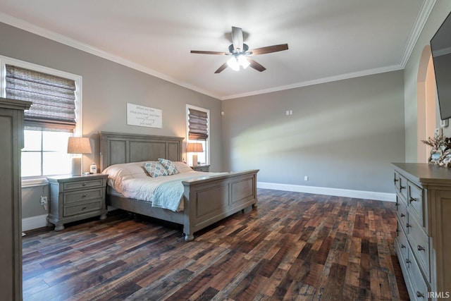 bedroom with ceiling fan, crown molding, and dark hardwood / wood-style floors