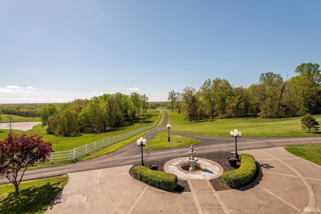 view of nearby features featuring a lawn