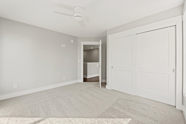 51 Ln 345 Crooked Lk, Angola, IN 46703 - unfurnished bedroom with carpet, ceiling fan, and a closet