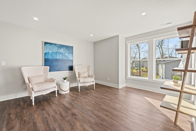 51 Ln 345 Crooked Lk, Angola, IN 46703 - living area with a textured ceiling and dark wood-type flooring