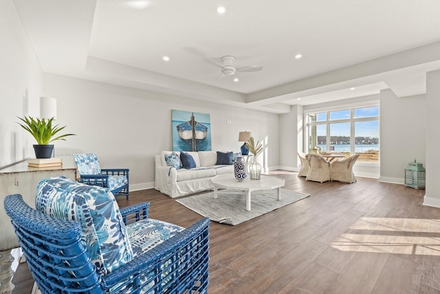 51 Ln 345 Crooked Lk, Angola, IN 46703 - living room with a tray ceiling, wood-type flooring, ceiling fan, and a water view