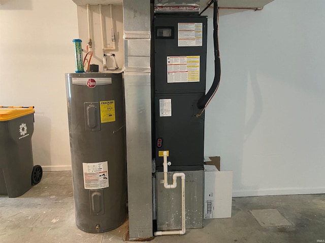 utility room featuring heating utilities and electric water heater