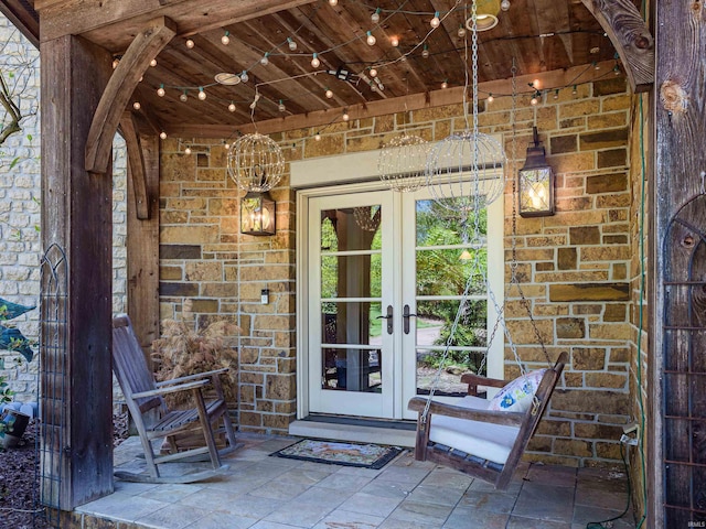 property entrance featuring french doors