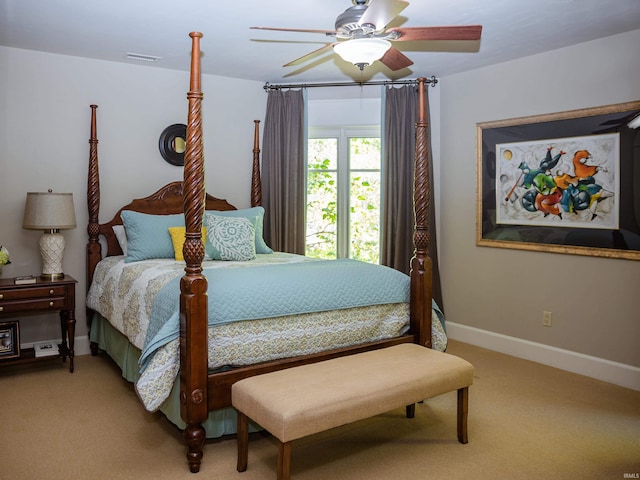 bedroom with ceiling fan and carpet